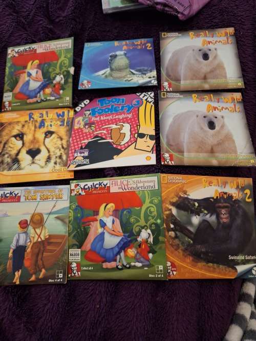 Kids DVDs National Geographic and cartoons JOB LOT