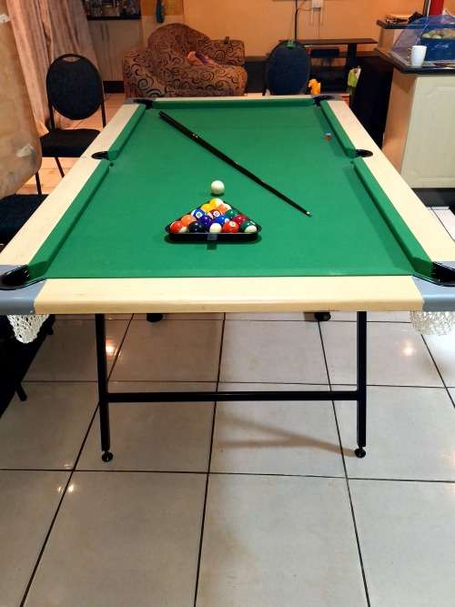 Fold away pool table