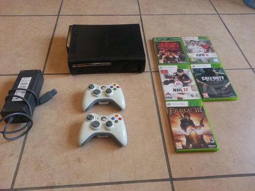 Black Xbox 360, 120GB HDD, 2 Controllers and Games