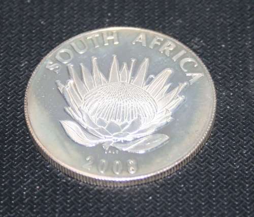 2008 UNC R1 GHANDI COIN IN BAG WITH CERTIFICATE