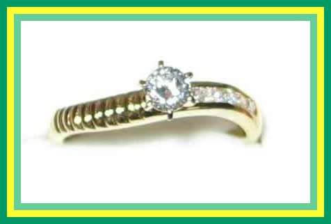 Solitaire style zirconia set in yellow gold overlay ring