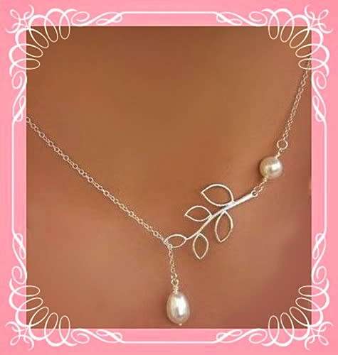 Alloy necklace with leaf and faux pearl bead detail