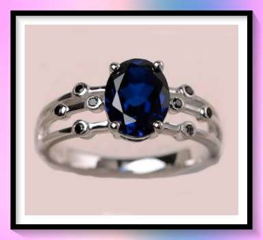 Beautiful oval cut simulated sapphire ring size: 8