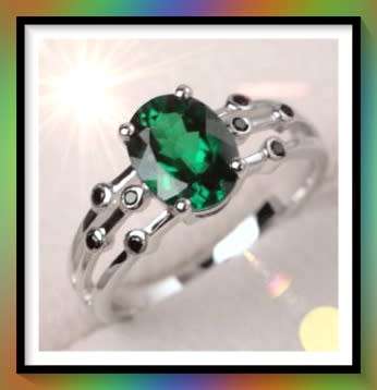 Lovely simulated emerald oval cut ring size 9
