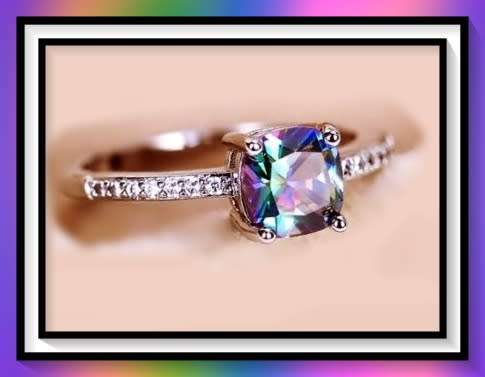 Beautiful simulated mystic topaz ring size 7