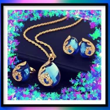 Interesting simulated sapphire necklace, earring and ring set