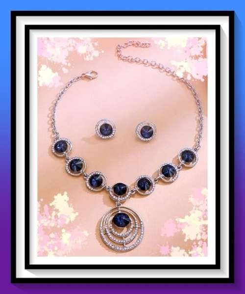 Lovely round cut design simulated sapphire necklace and earring set