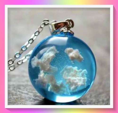Fashionable Cloud Detail Ball Charm Necklace made in polyresin