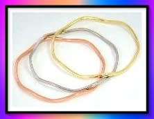 Yellow Gold Wavy Bangle