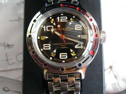 RUSSIAN MADE VOSTOK AUTOMATIC DIVING WATCH IN BOX WITH PAPERS.