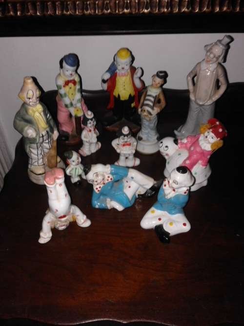 STUNNING COLLECTION OF PORCELEIN CLOWNS