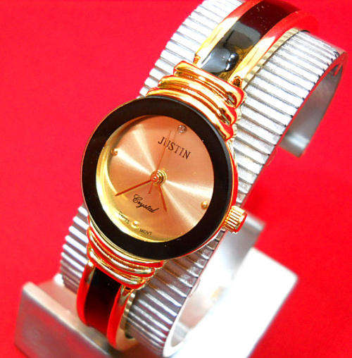 -LADIES GOLD AND BLACK COLORED METAL WATCH-