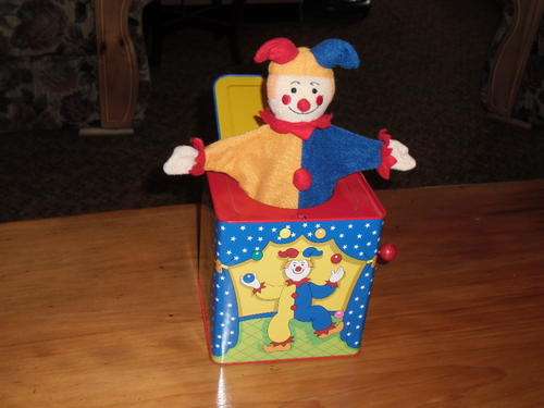 Jack in the box tinplate wind up musical toy
