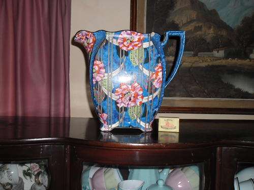 stunning old very large jug made by grimwades royal winton ivory England with 4 chips