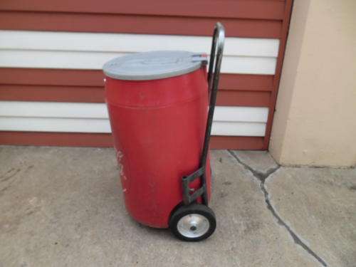 large original vintage Coca Cola plastic drum/bin/cooler on a metal trolley
