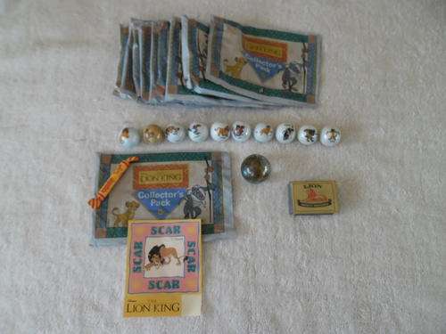 11 collectable lion king marbles with original packing and sweets