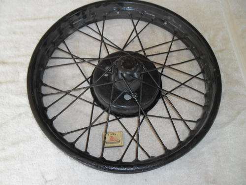 old Austin wire steel wheel