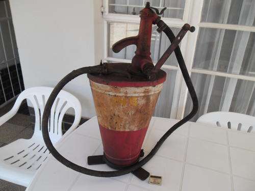 stunning original very old un-restore Caltex pump on oil can with foot stand