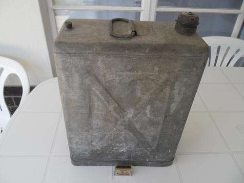 old unusual jerry petrol can with brass screw on caps weighs 4kg rare