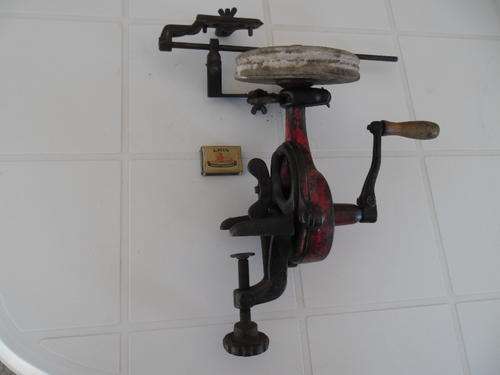 very old and heavy cast iron knife sharpener rare