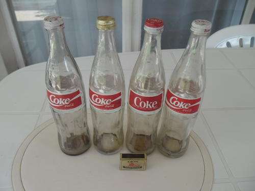 4 original coca cola 500ml glass bottle with metal caps return for deposit