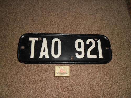old small black number plate raised letters
