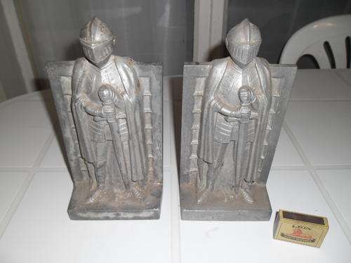 pair of cast aluminum book ends