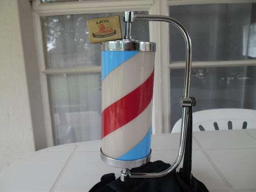 art deco chrome metal bracket and glass shade light & added stickers to look like a barber pole