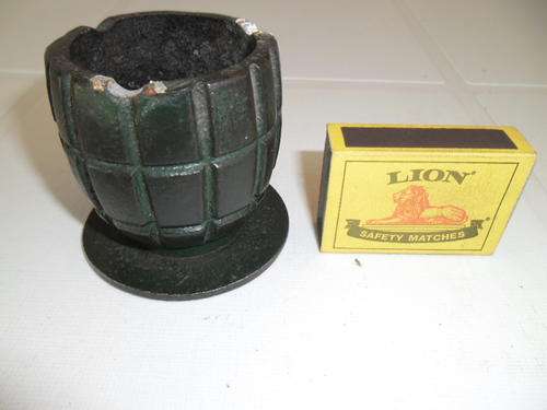 heavy metal hand grenade half shell with foot plate astray probably trench art size 60mm high