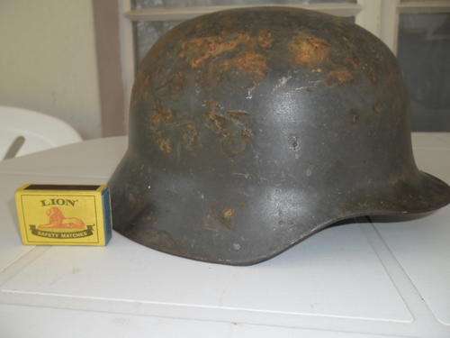 very old steel helmet look like German helmet with inner lining