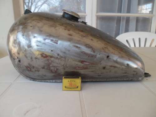 Old metal motor cycle petrol tank about 530mm long with brackets ordinary postage R130
