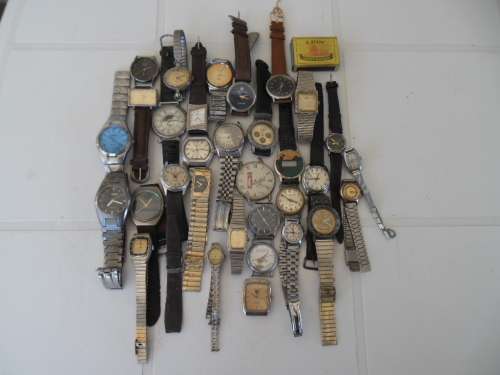 32 - men`s and ladies watches for spares or to be restore what you see is what you get