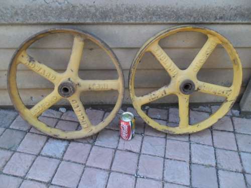 Rare two original cast iron Howard Bedford wheels size 440mm wide weighs 14kg each