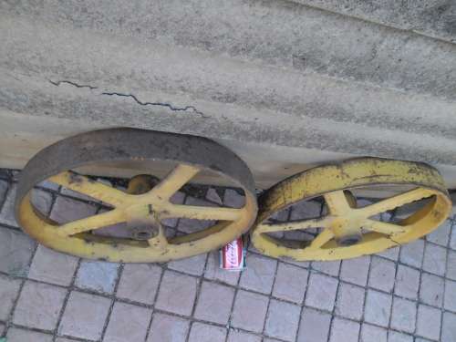 Rare two original cast iron Howard Bedford wheels size 440mm wide weighs 14kg each