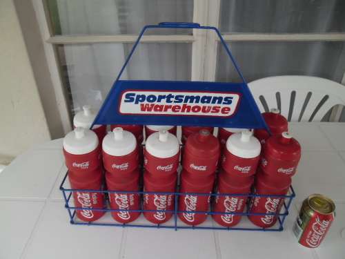 Original 12 coca cola plastic bottles metal stand sportsmans warehouse 510mm wide