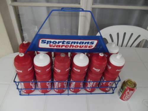 Original 12 coca cola plastic bottles metal stand sportsmans warehouse 510mm wide