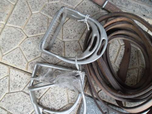 2 sets of stirrup made in England and some leather straps postage is R70