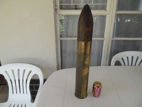 Brass and wood bullet shape display item size is 660mm long postnet postage R140