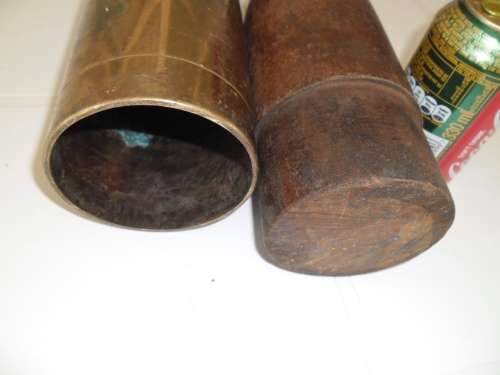 Brass and wood bullet shape display item size is 660mm long postnet postage R140
