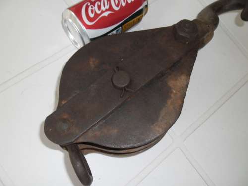 Stunning old large 2 wheel pulley see condition weighs 5kg size 360mm long postage is R80