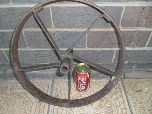 Very old wheel barrow metal wheel only postage is R100