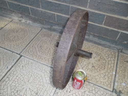 Very old wheel barrow metal wheel only postage is R100