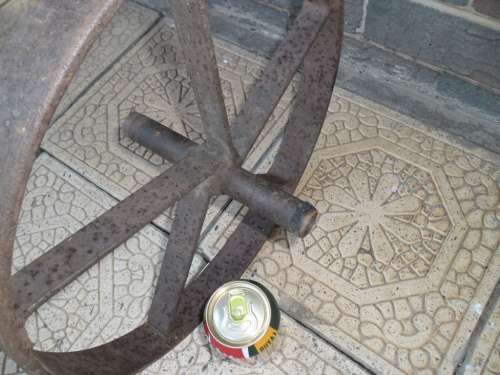 Very old wheel barrow metal wheel only postage is R100