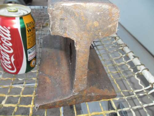 Rail made in to a anvil 210mm long x 146mm high weighs 9kg postage is R110