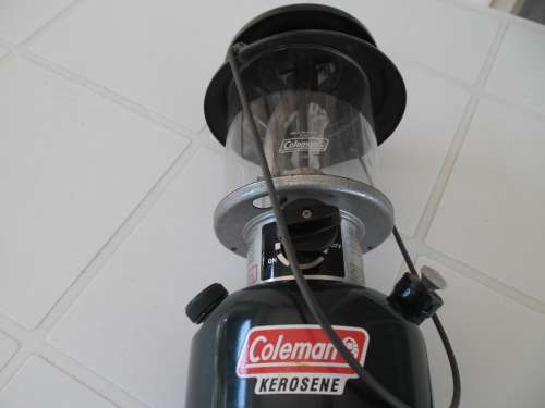 Original Coleman lamp with glass shade made in U.S.A. 1996 size is 310mm high postage is R80