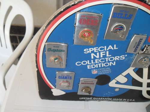 Rare Original Zippo Special NFL Collectors Edition 6 lighters with advertizing board