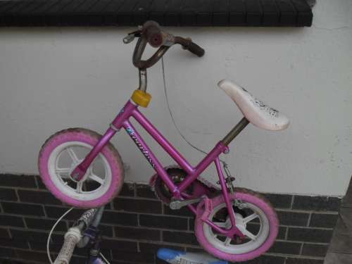 Used small Peerless bicycle and 16" BMX Raleigh bicycle price for both collection only