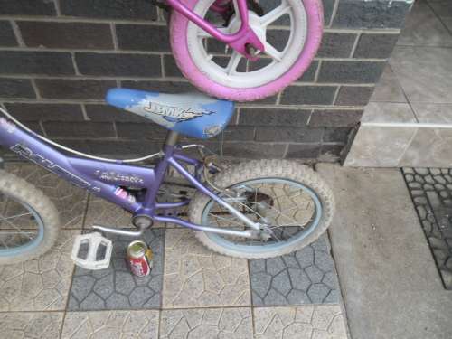 Used small Peerless bicycle and 16" BMX Raleigh bicycle price for both collection only
