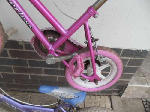 Used small Peerless bicycle and 16" BMX Raleigh bicycle price for both collection only