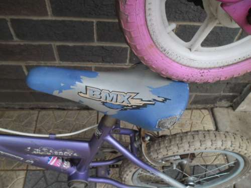 Used small Peerless bicycle and 16" BMX Raleigh bicycle price for both collection only